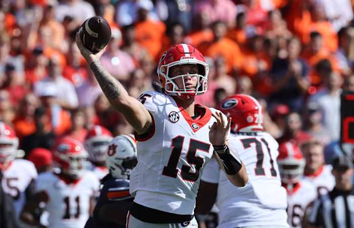 Sep 30, 2023; Auburn, Alabama, USA; Georgia Bulldogs quarterback Carson Beck (15) throws a pass against the Auburn Tigers during the first quarter at Jordan-Hare Stadium.